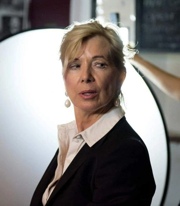 Joan looking over her shoulder as the Matriarch